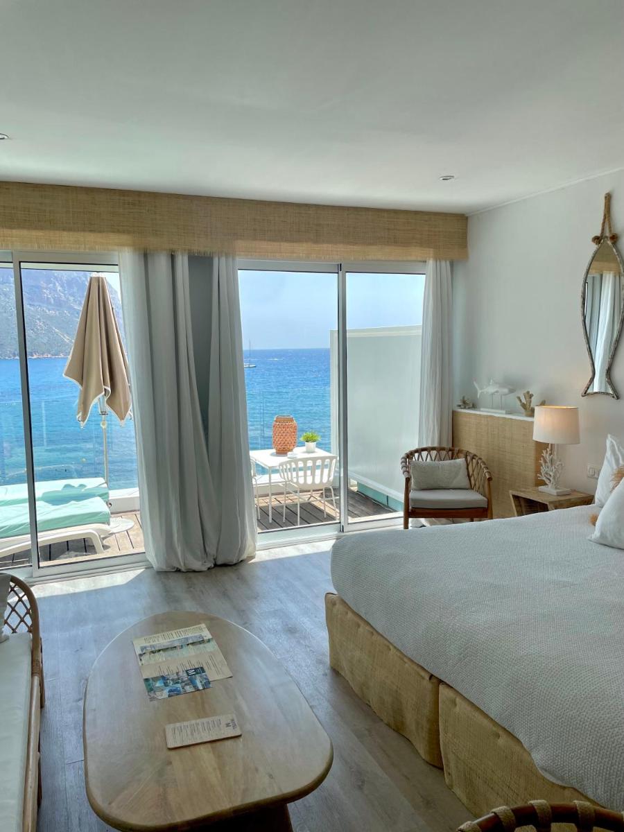 Un ou plusieurs lits dans un hébergement de l'établissement Hotel de La Plage - Mahogany