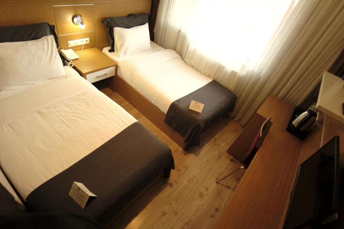 Rhisos Otel - Housity