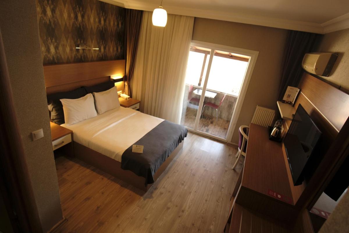 Rhisos Otel - Housity