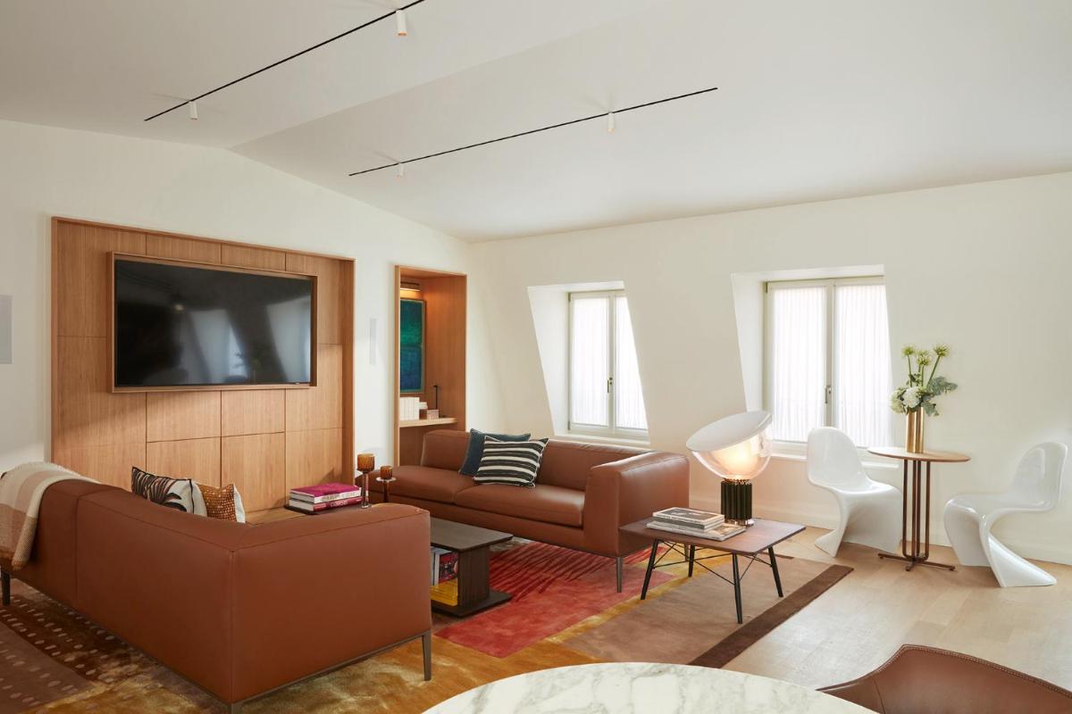 Télévision ou salle de divertissement dans l'établissement Villa-des-Prés