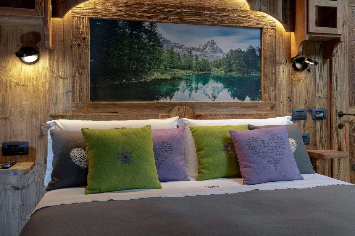 Matterhorn Retreat Francois - Camere in centro Cervina con Colazione, Accesso SPA e WiFi - Housity