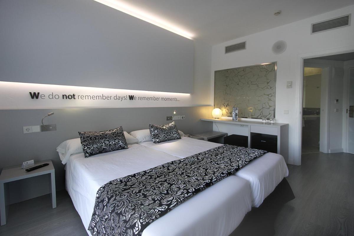 Cama o camas de una habitación en BG Pamplona