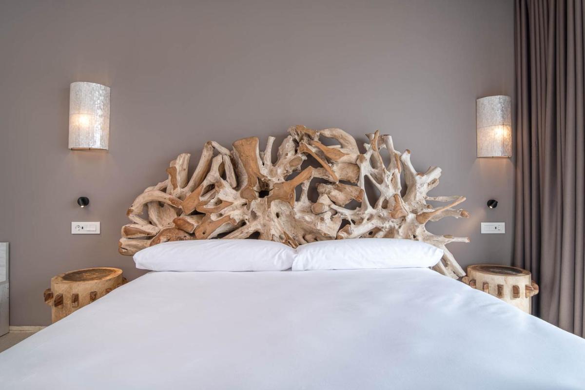 Cama o camas de una habitación en Cádiz Bahía by QHotels