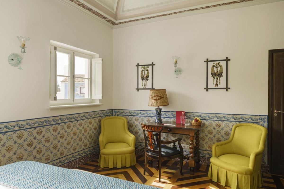 Uma área de estar em Vermelho Melides - Relais & Châteaux