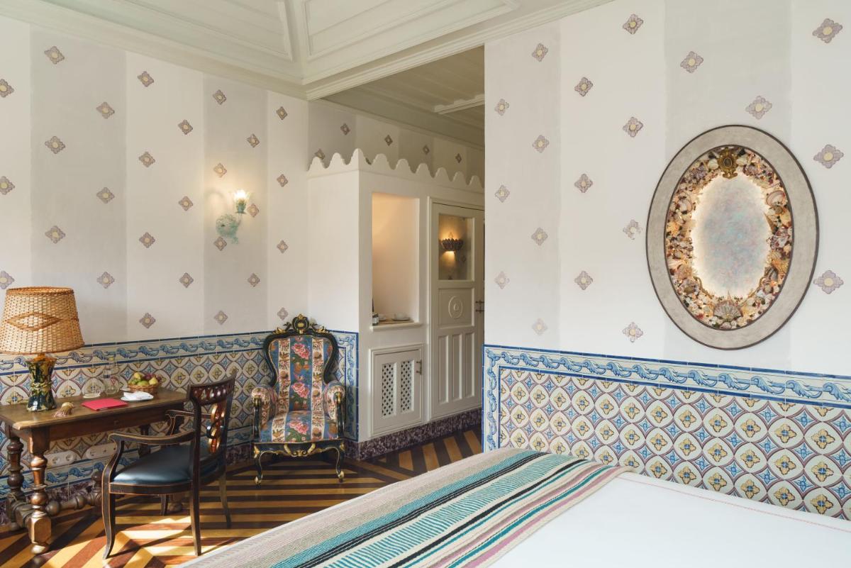 Uma área de estar em Vermelho Melides - Relais & Châteaux