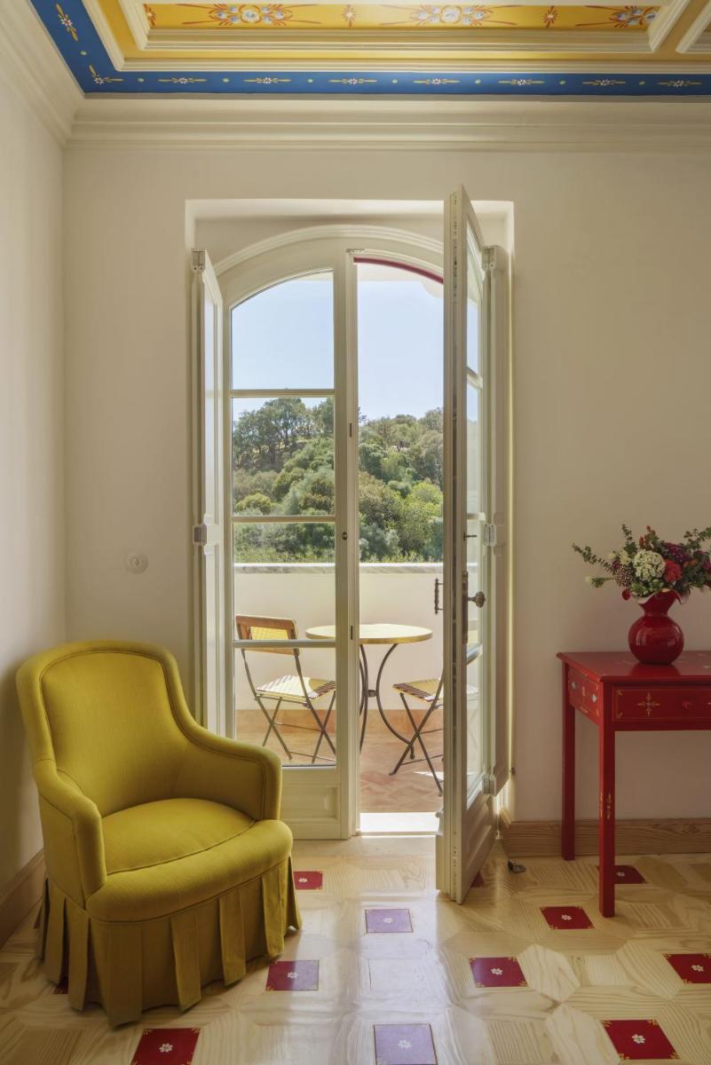 Uma área de estar em Vermelho Melides - Relais & Châteaux
