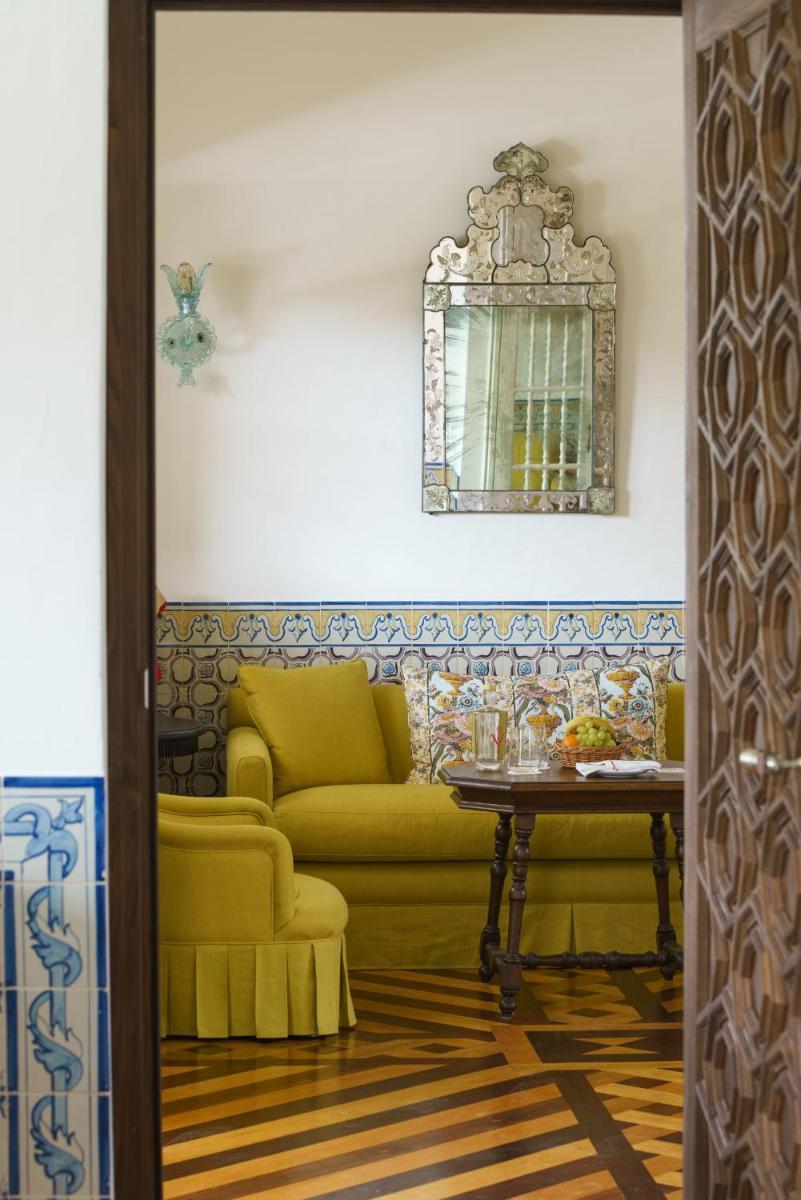 Uma área de estar em Vermelho Melides - Relais & Châteaux