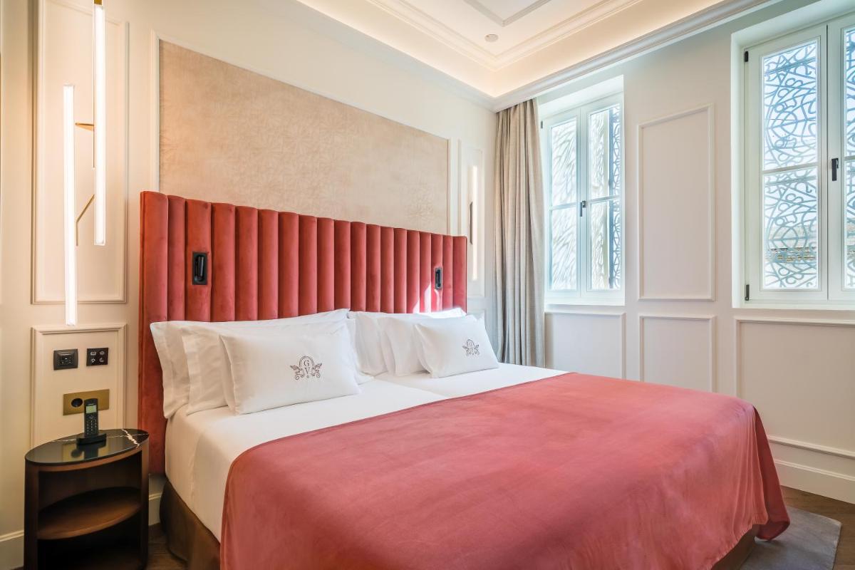 Cama o camas de una habitación en Palacio Gran Vía, a Royal Hideaway Hotel