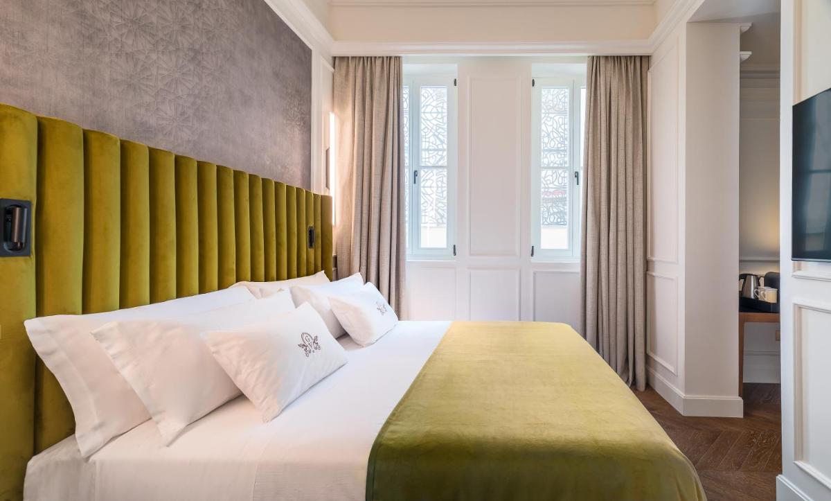 Cama o camas de una habitación en Palacio Gran Vía, a Royal Hideaway Hotel
