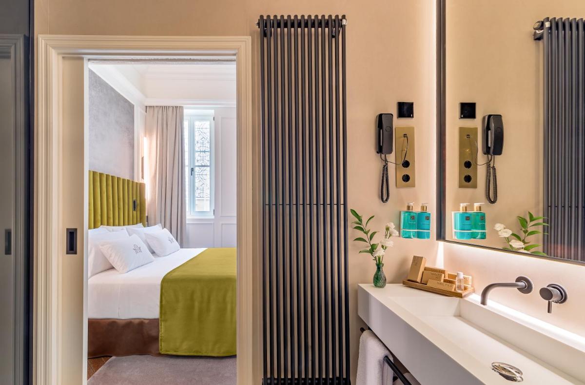 Cama o camas de una habitación en Palacio Gran Vía, a Royal Hideaway Hotel