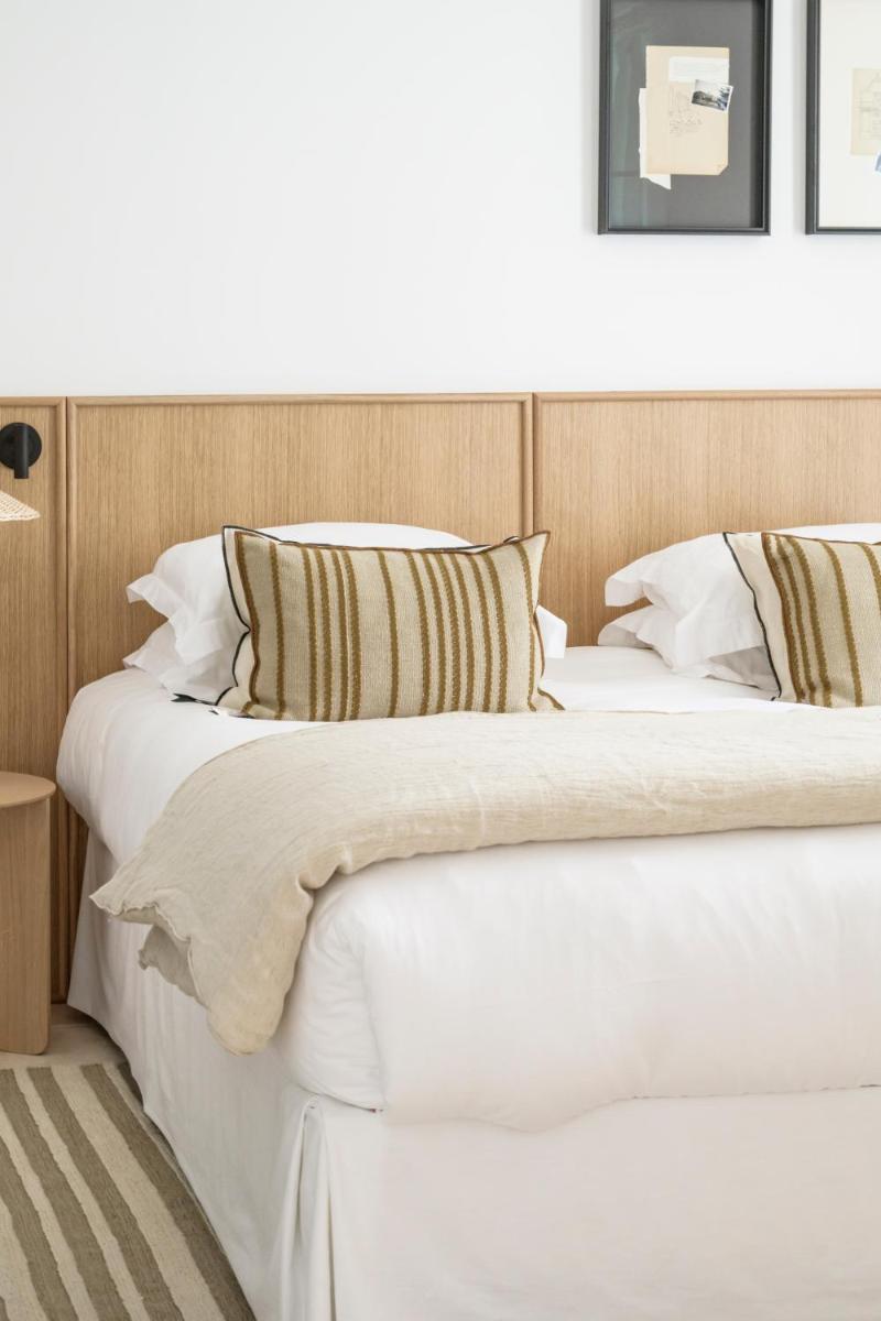 Un ou plusieurs lits dans un hébergement de l'établissement Le Couvent des Minimes, un Hôtel & Spa L'Occitane en Provence