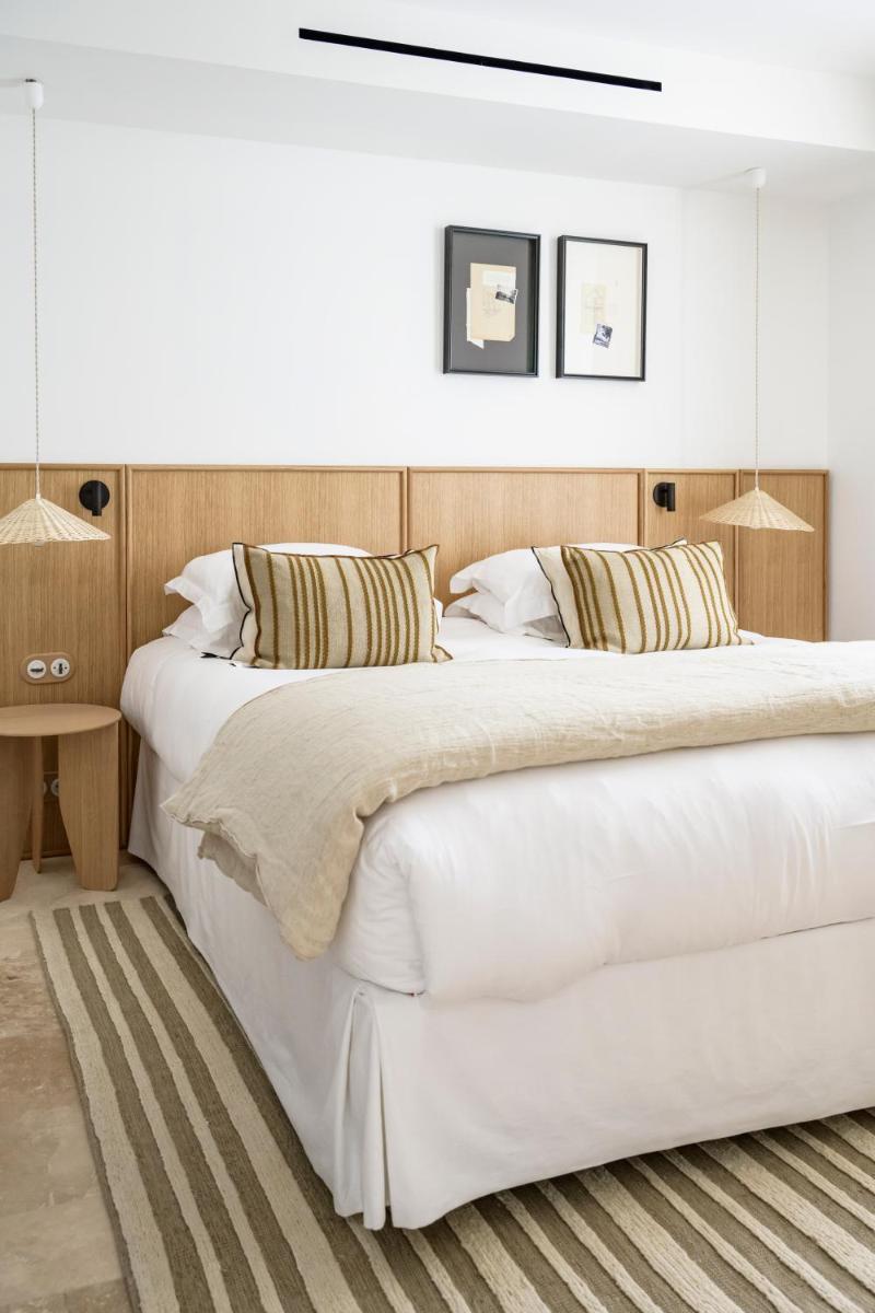 Un ou plusieurs lits dans un hébergement de l'établissement Le Couvent des Minimes, un Hôtel & Spa L'Occitane en Provence