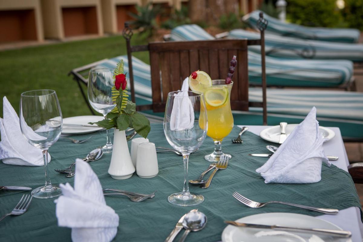 M'kango Golfview Hotel - Housity