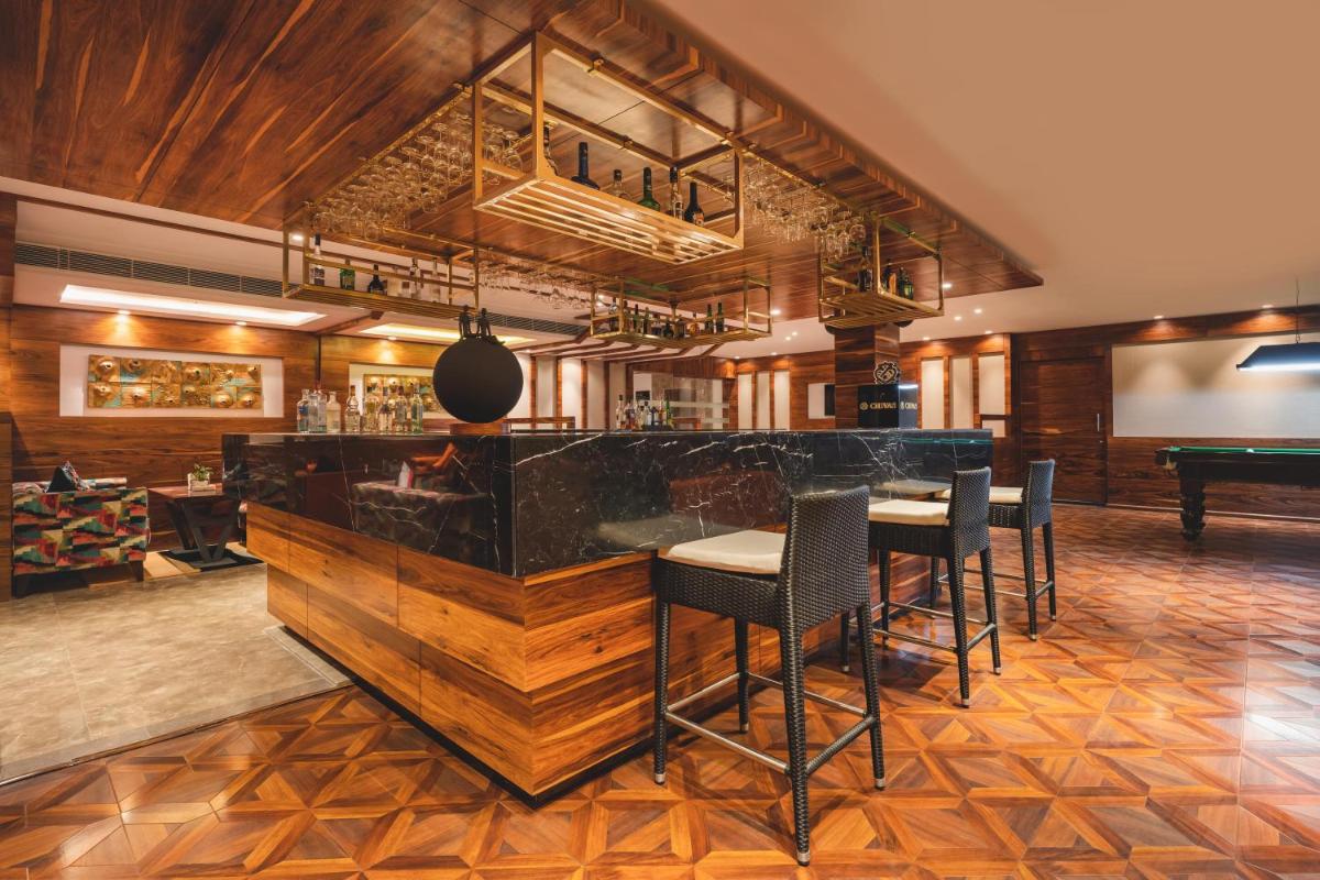 a bar in a restaurant with a pool table at Welcomhotel by ITC Hotels, Shimla in Shimla