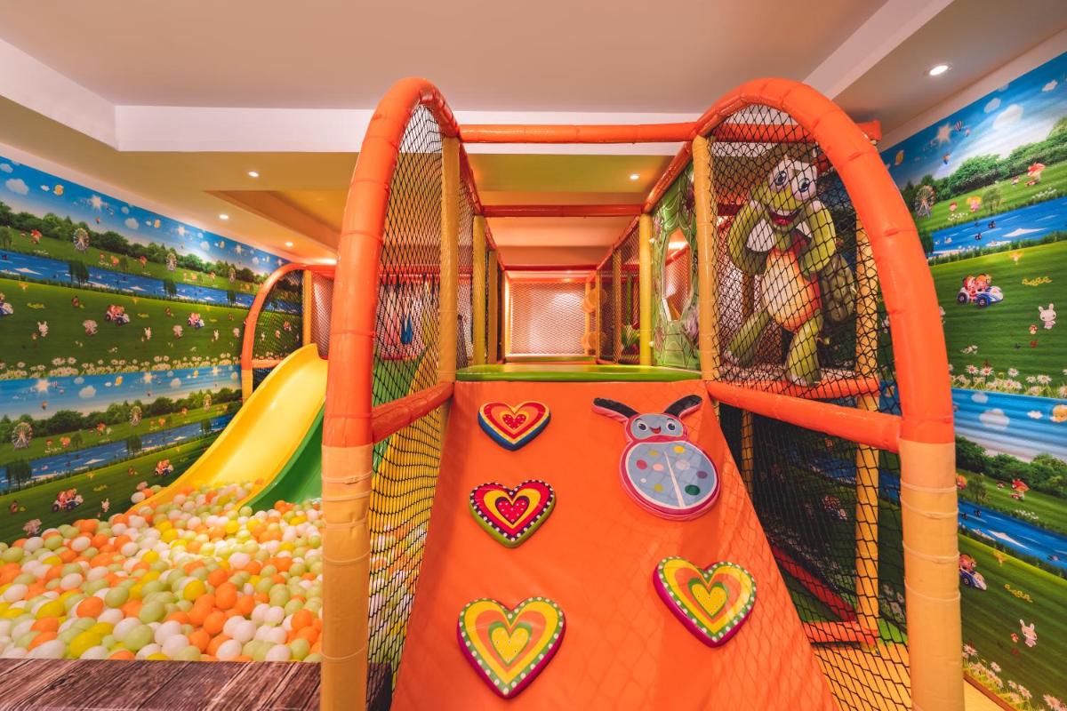 a childrens play room with a roller coaster at Welcomhotel by ITC Hotels, Shimla in Shimla