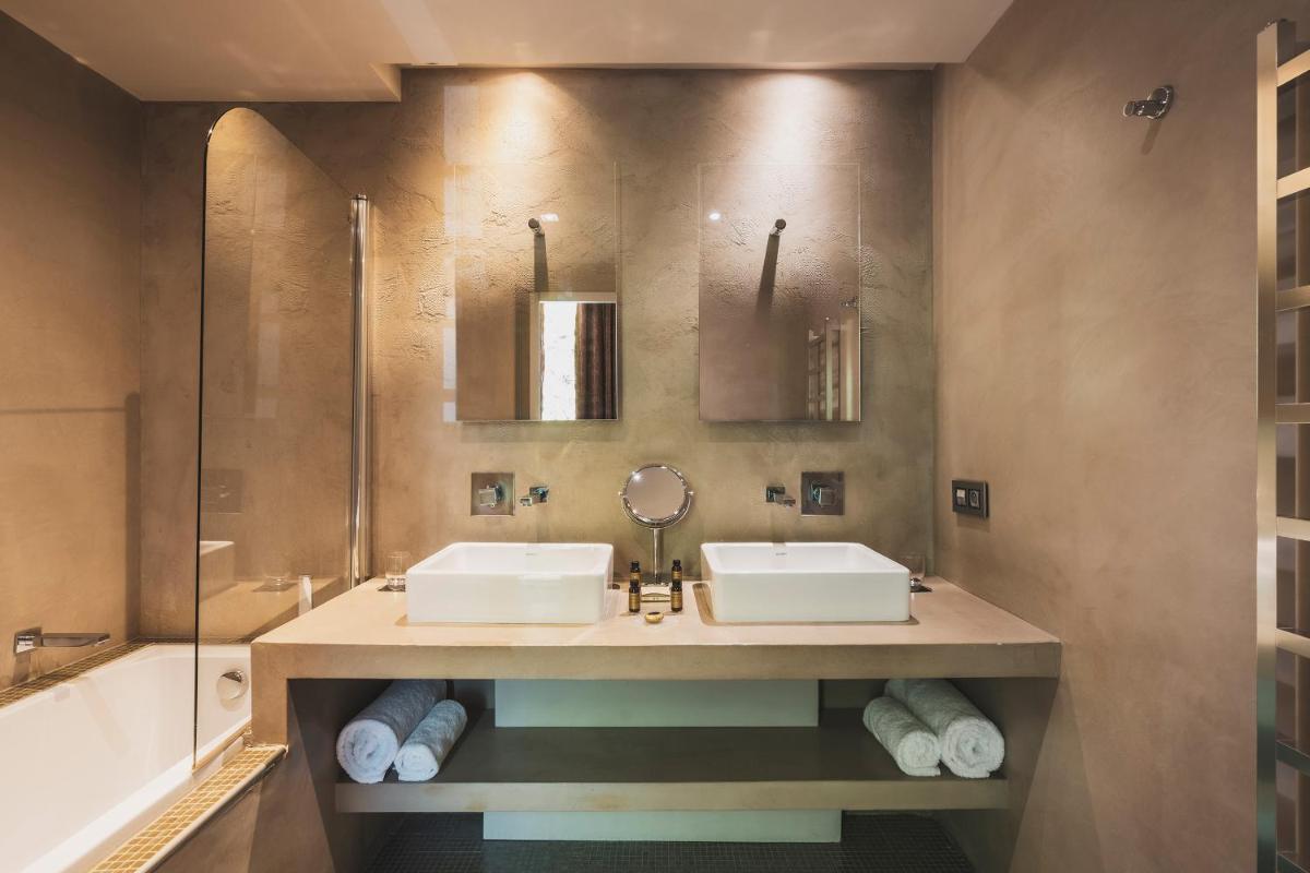 Salle de bains dans l'établissement Les Lodges Sainte-Victoire Hotel & Spa