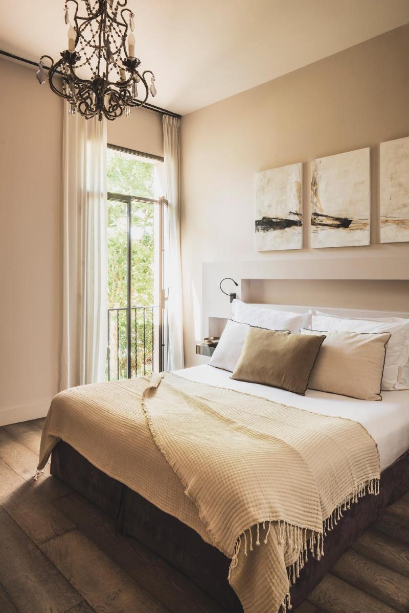 Un ou plusieurs lits dans un hébergement de l'établissement Les Lodges Sainte-Victoire Hotel & Spa