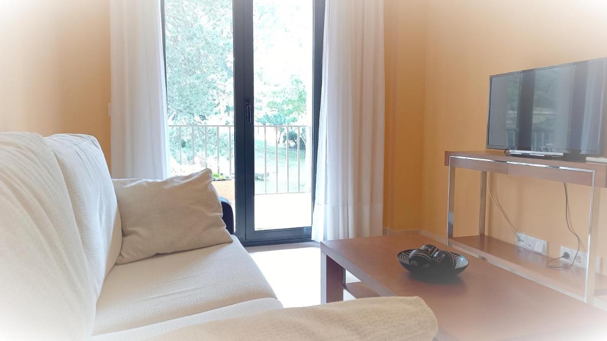 Una televisión o centro de entretenimiento en Hotel Balneario de Retortillo