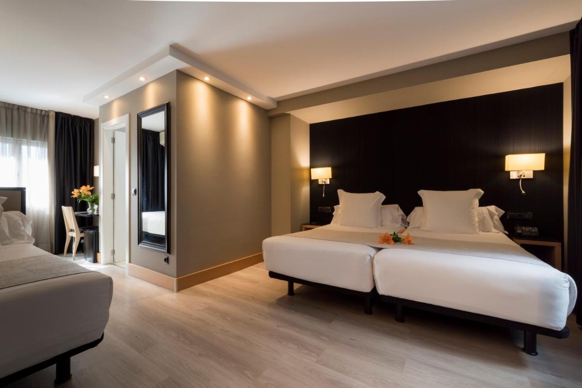 Cama o camas de una habitación en Hotel Plaza