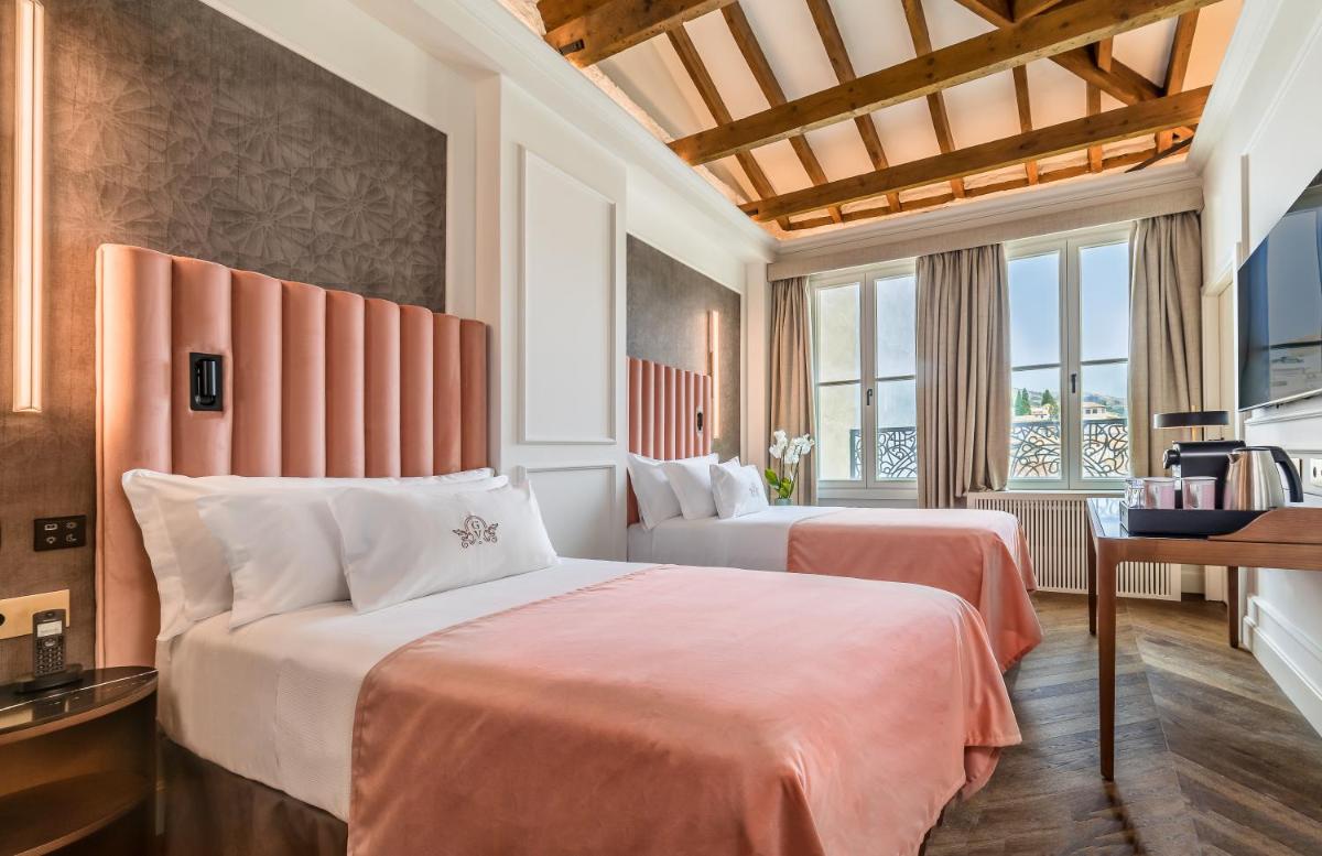 Cama o camas de una habitación en Palacio Gran Vía, a Royal Hideaway Hotel