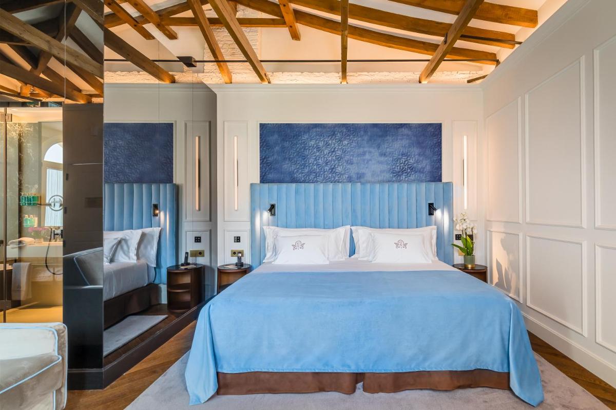 Cama o camas de una habitación en Palacio Gran Vía, a Royal Hideaway Hotel