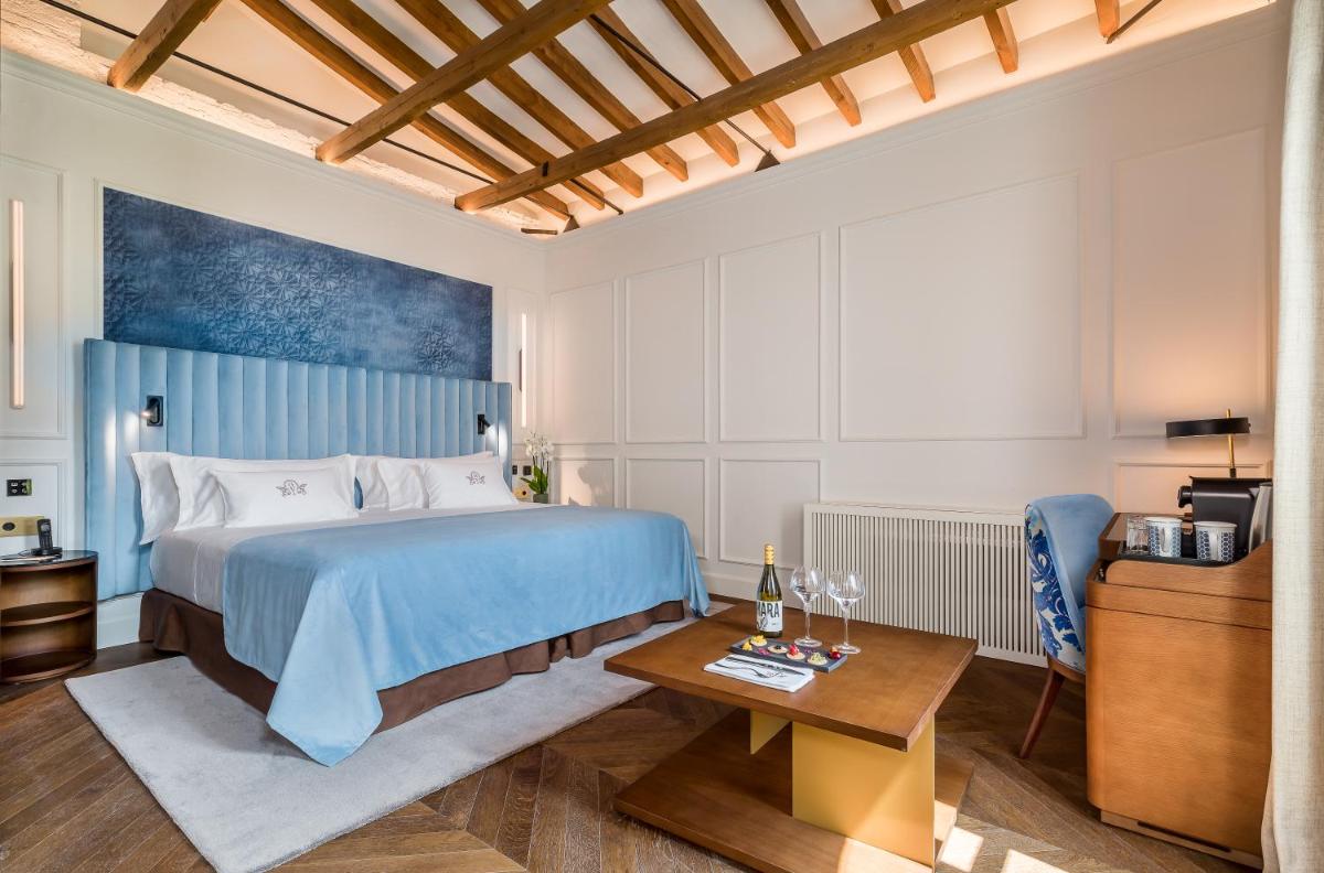 Cama o camas de una habitación en Palacio Gran Vía, a Royal Hideaway Hotel