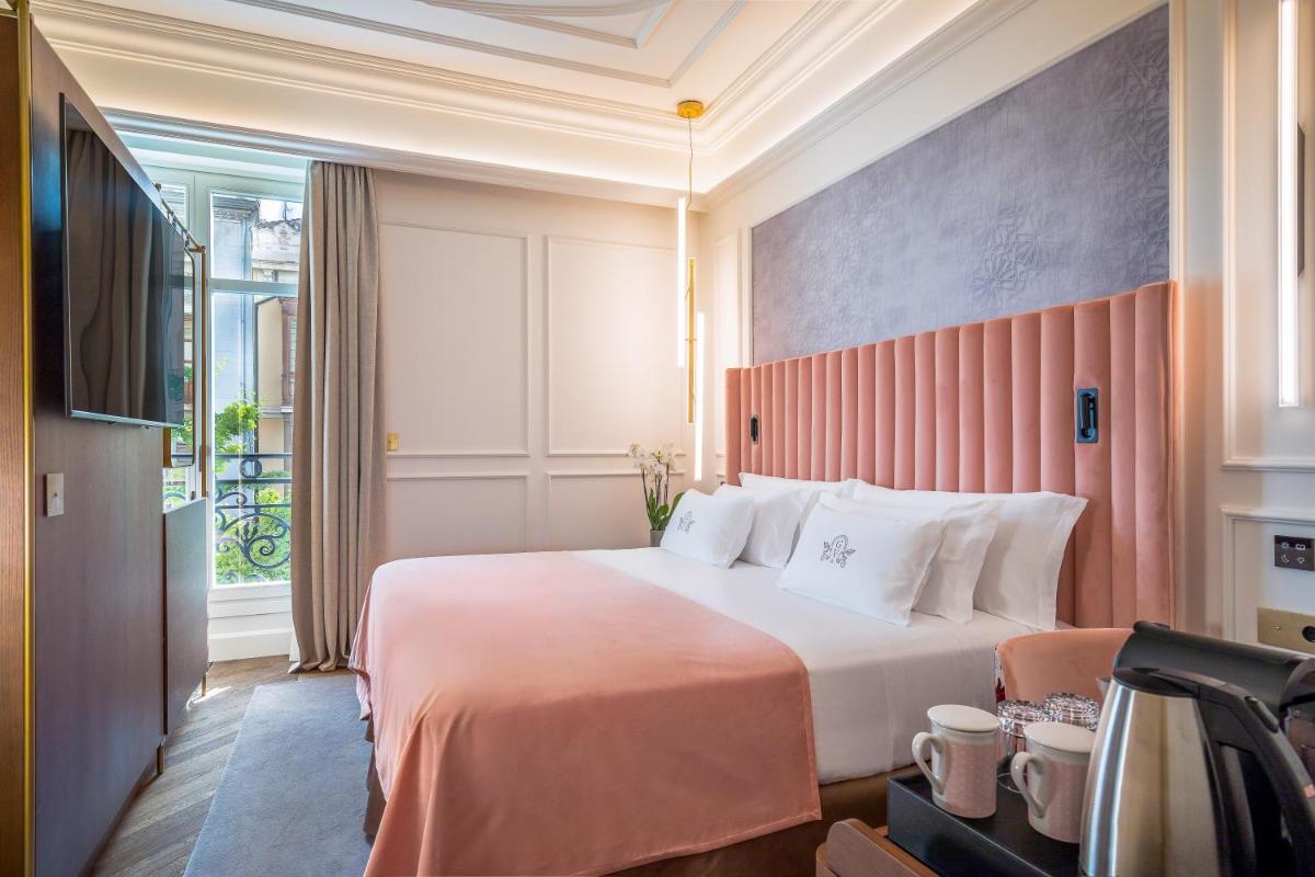 Cama o camas de una habitación en Palacio Gran Vía, a Royal Hideaway Hotel