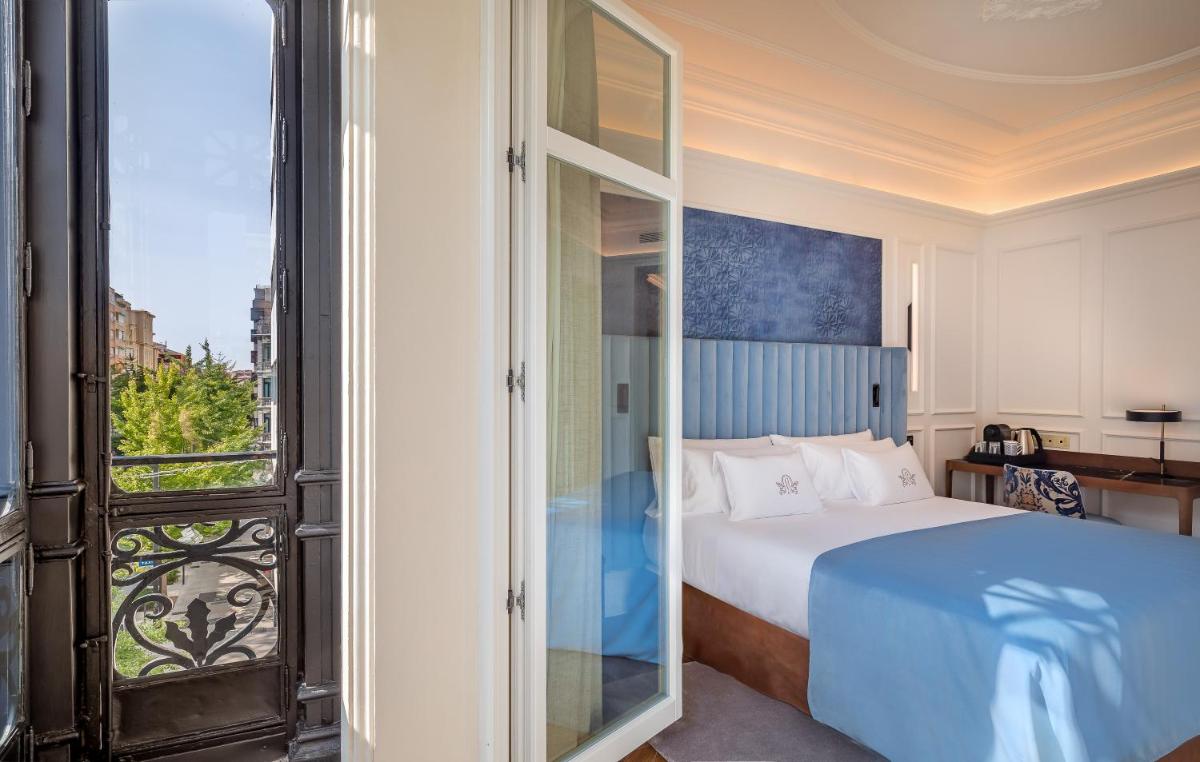 Cama o camas de una habitación en Palacio Gran Vía, a Royal Hideaway Hotel