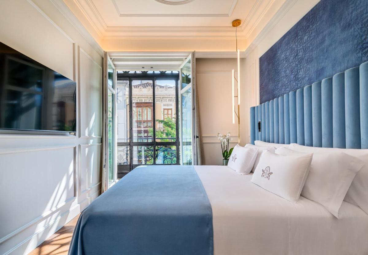 Cama o camas de una habitación en Palacio Gran Vía, a Royal Hideaway Hotel