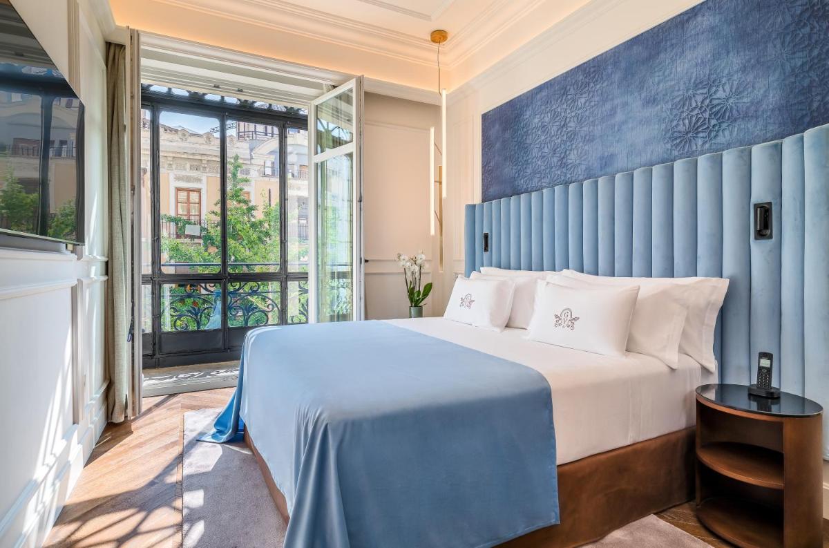 Cama o camas de una habitación en Palacio Gran Vía, a Royal Hideaway Hotel