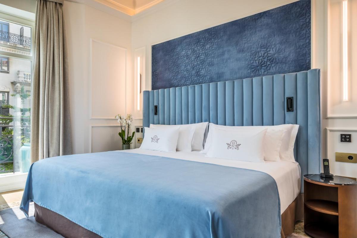 Cama o camas de una habitación en Palacio Gran Vía, a Royal Hideaway Hotel