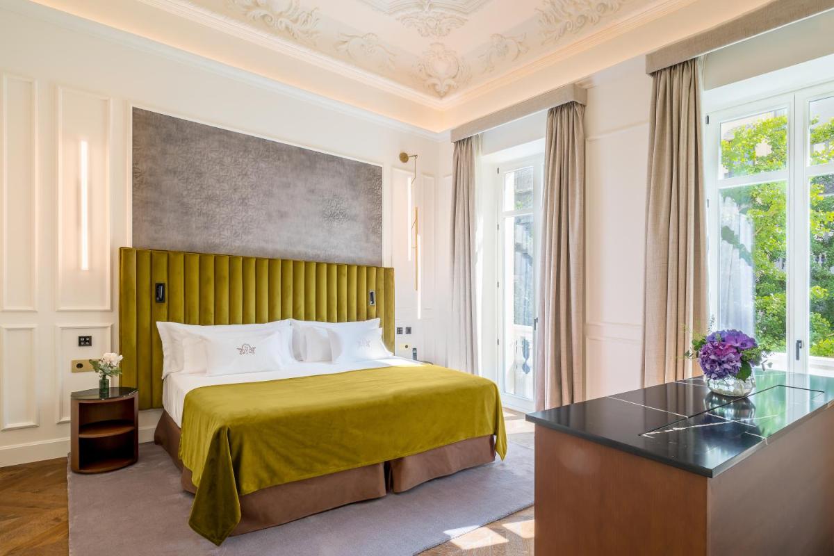 Cama o camas de una habitación en Palacio Gran Vía, a Royal Hideaway Hotel