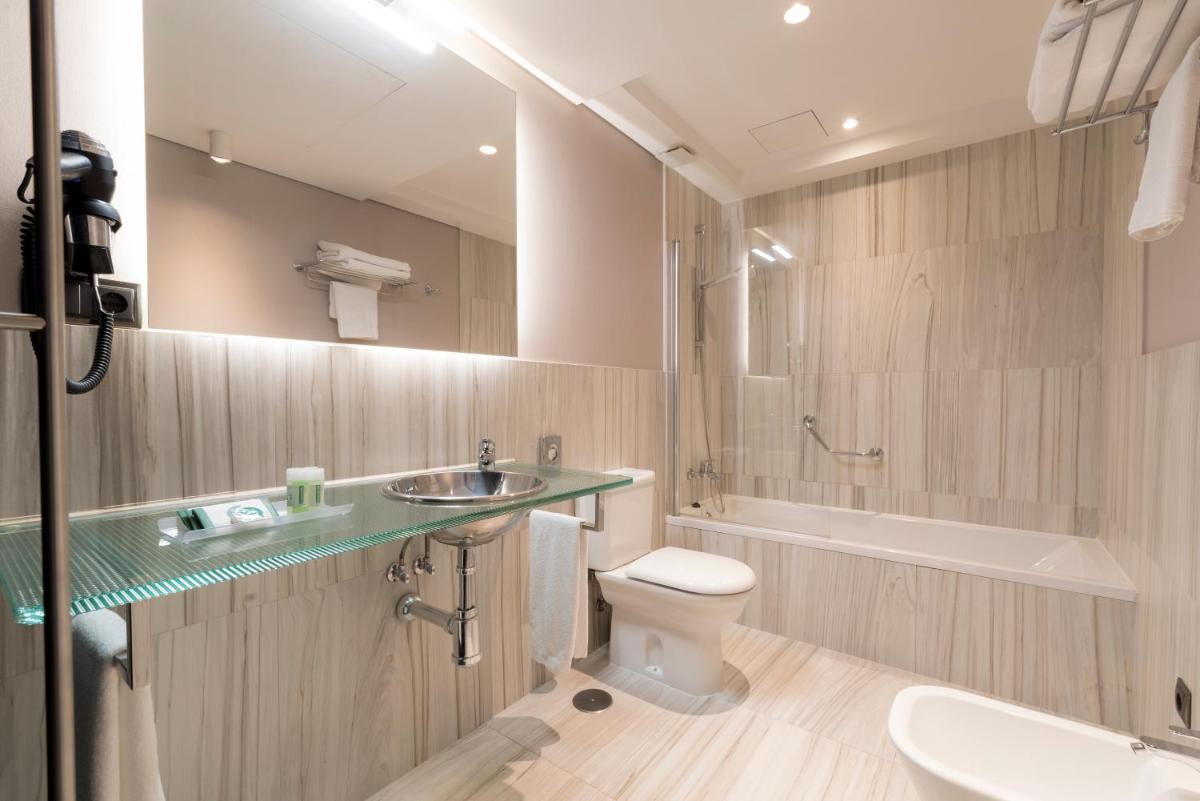 Un baño de Hotel Plaza