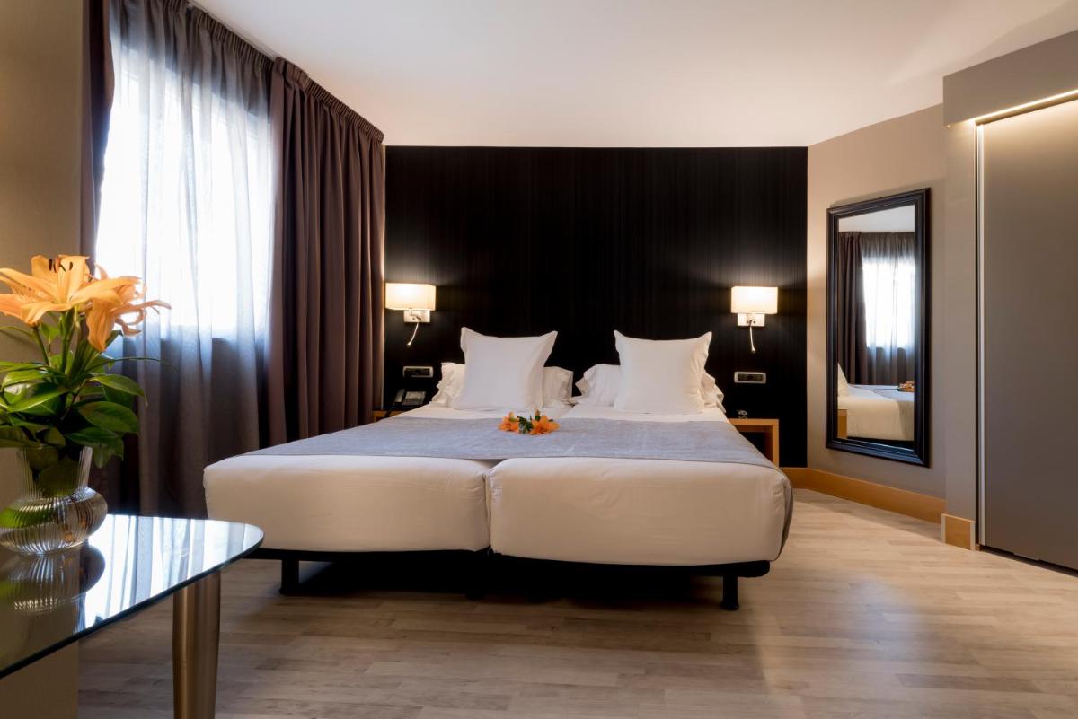 Cama o camas de una habitación en Hotel Plaza