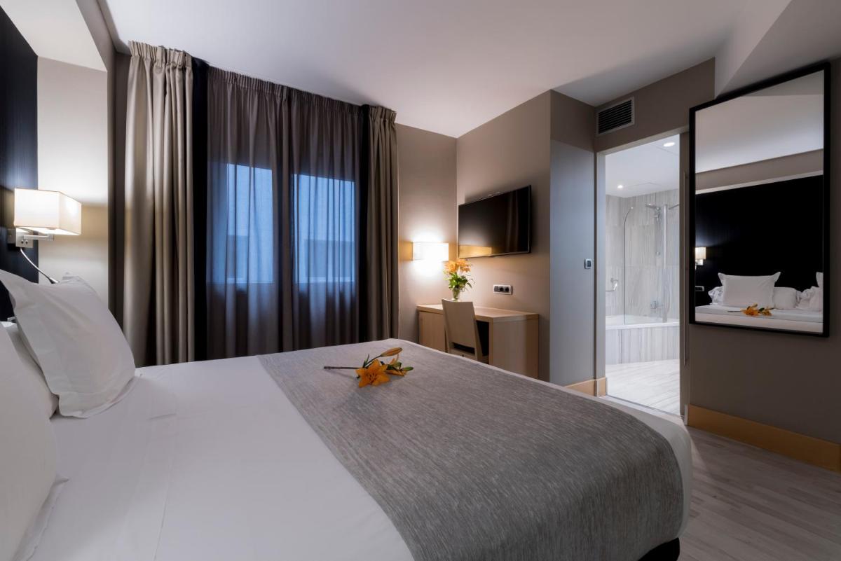 Cama o camas de una habitación en Hotel Plaza