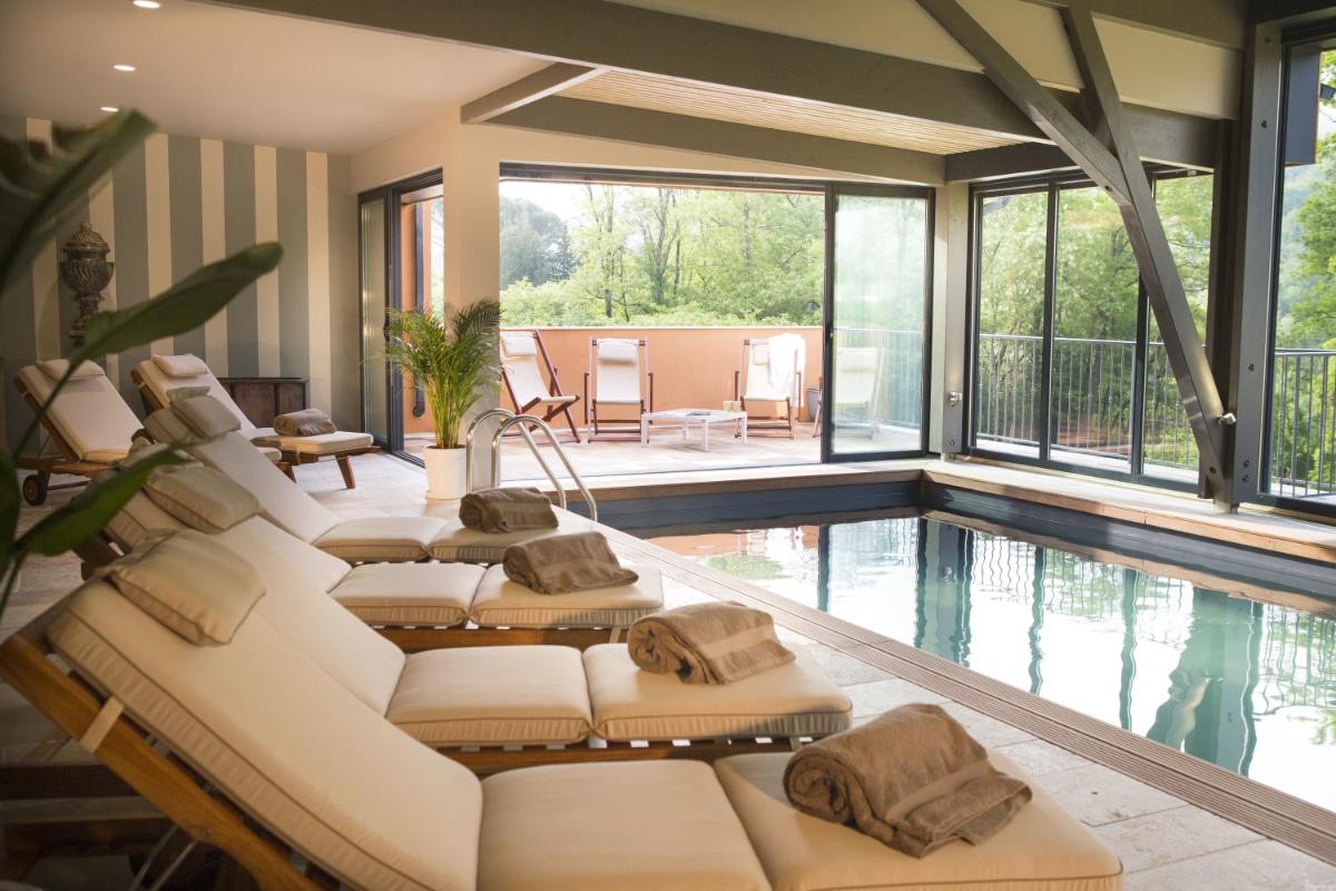 Coin salon dans l'établissement Hôtel-Spa Le Saint Cirq