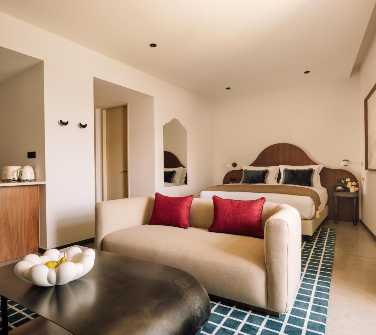 Uma cama ou camas num quarto em The Rebello Hotel & Spa - Small Luxury Hotels Of The World