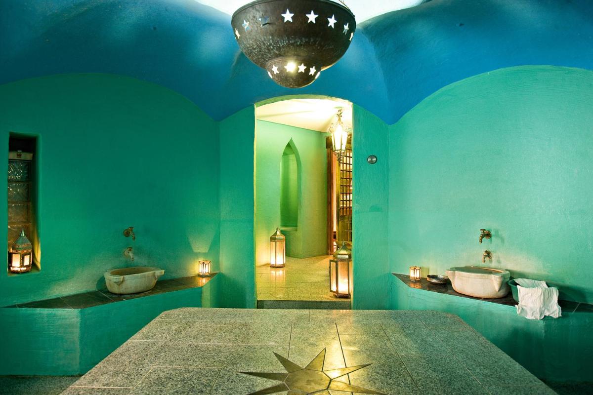 Ein Bett oder Betten in einem Zimmer der Unterkunft BLEICHE RESORT & SPA