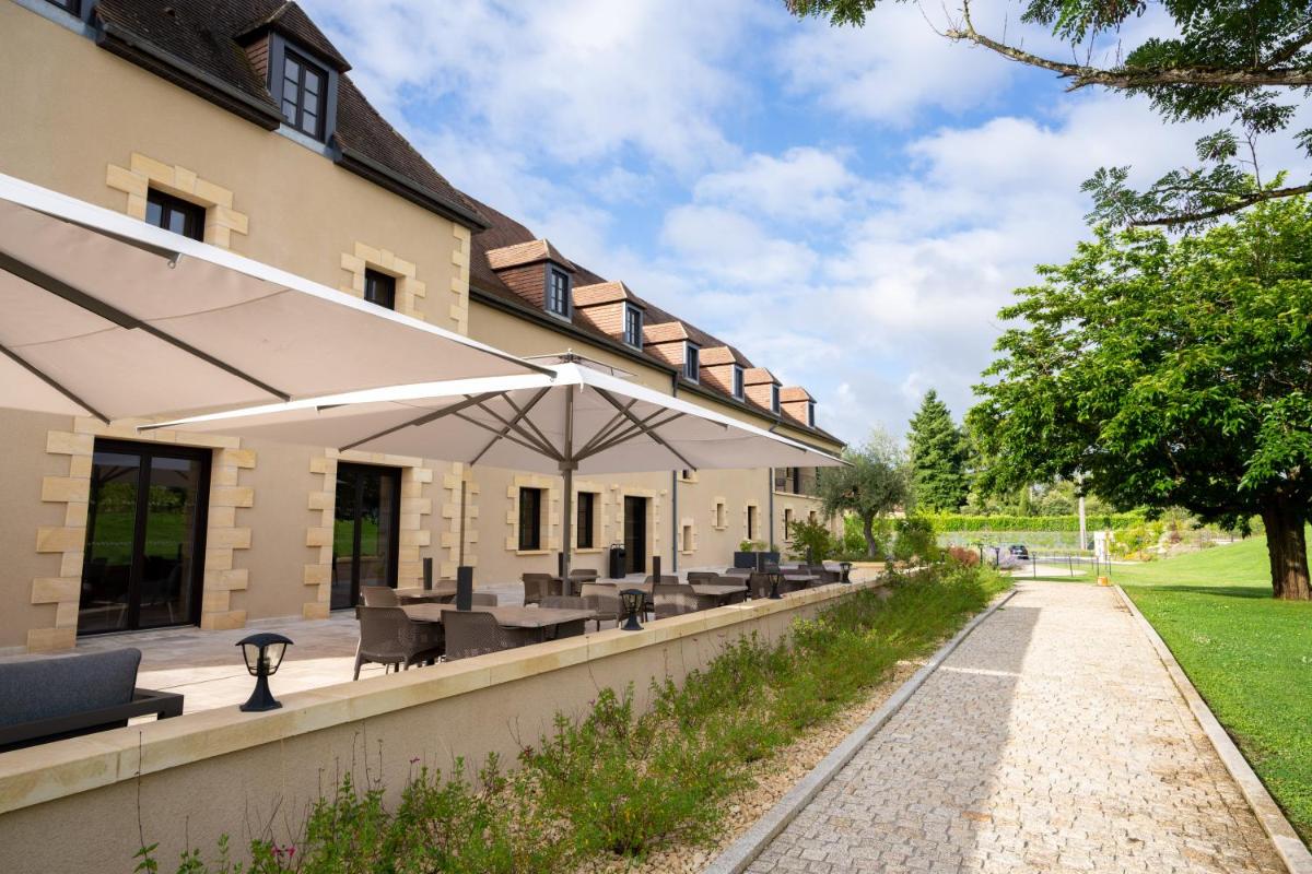 Jardin de l'établissement Hotel Le Perigord