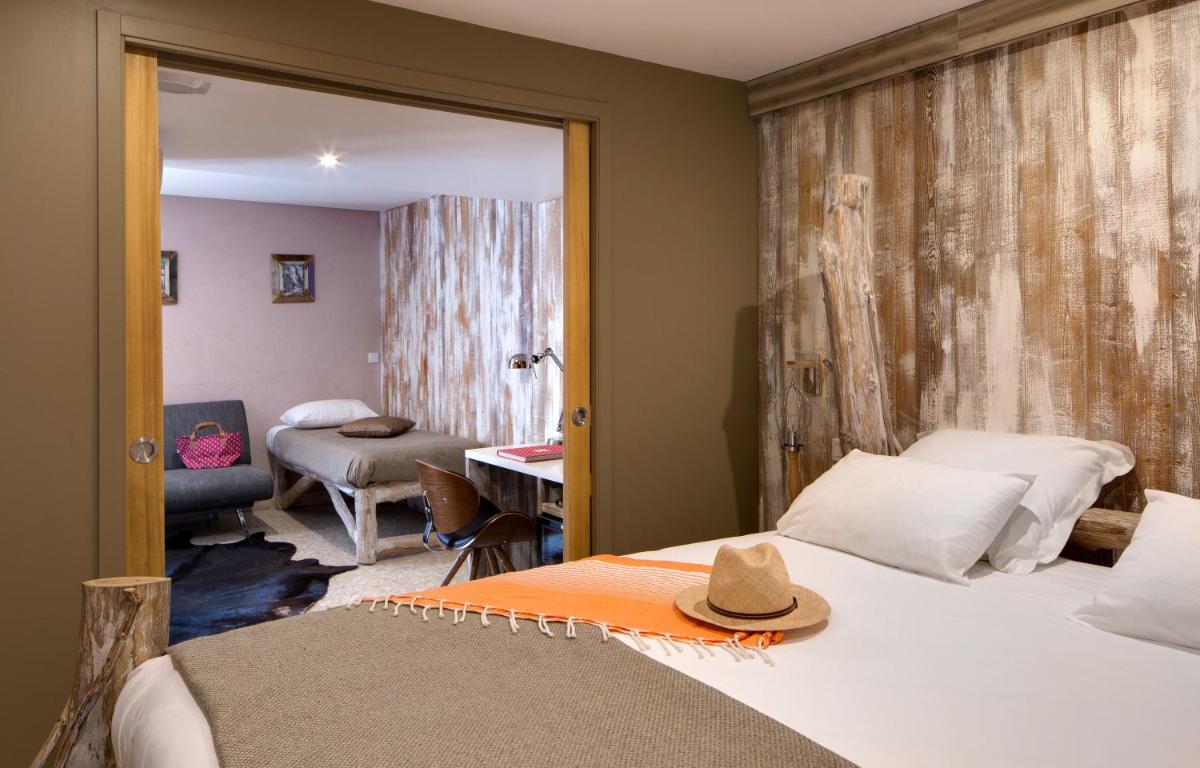 Un ou plusieurs lits dans un hébergement de l'établissement Vila De La Mar & Spa