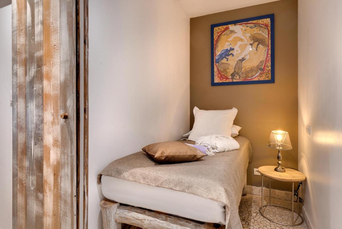 Un ou plusieurs lits dans un hébergement de l'établissement Vila De La Mar & Spa