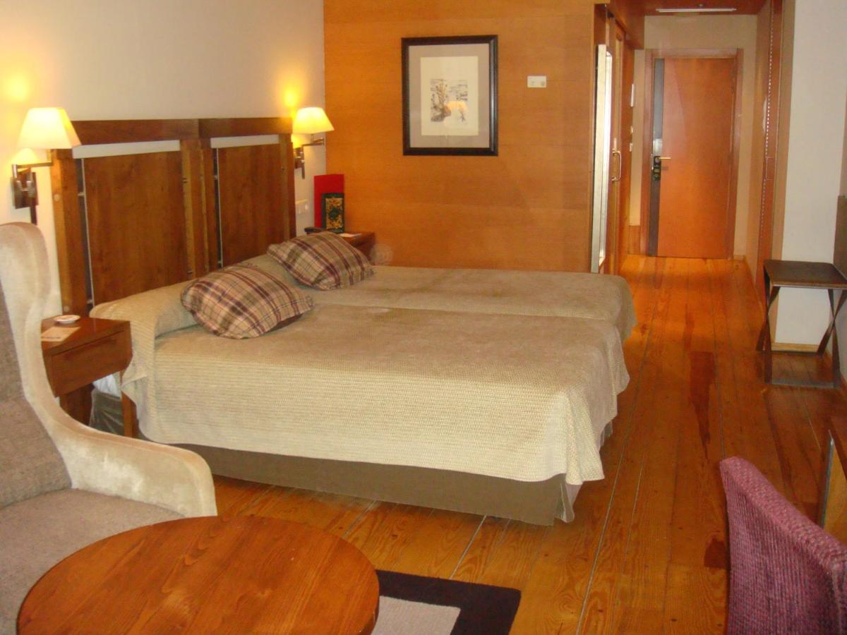 Cama o camas de una habitación en Parador de Santo Estevo