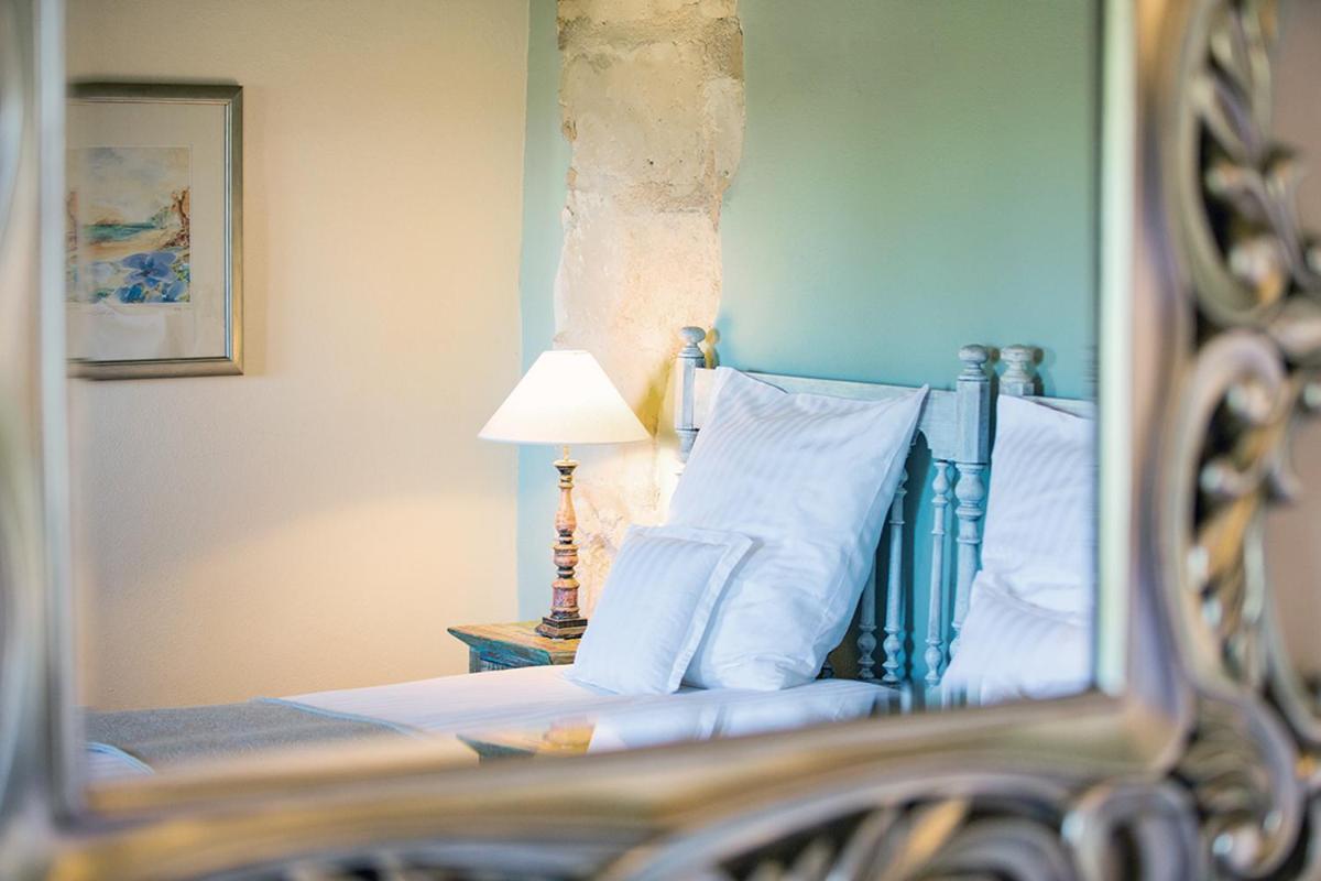 Cama o camas de una habitación en Casa Font i Roig