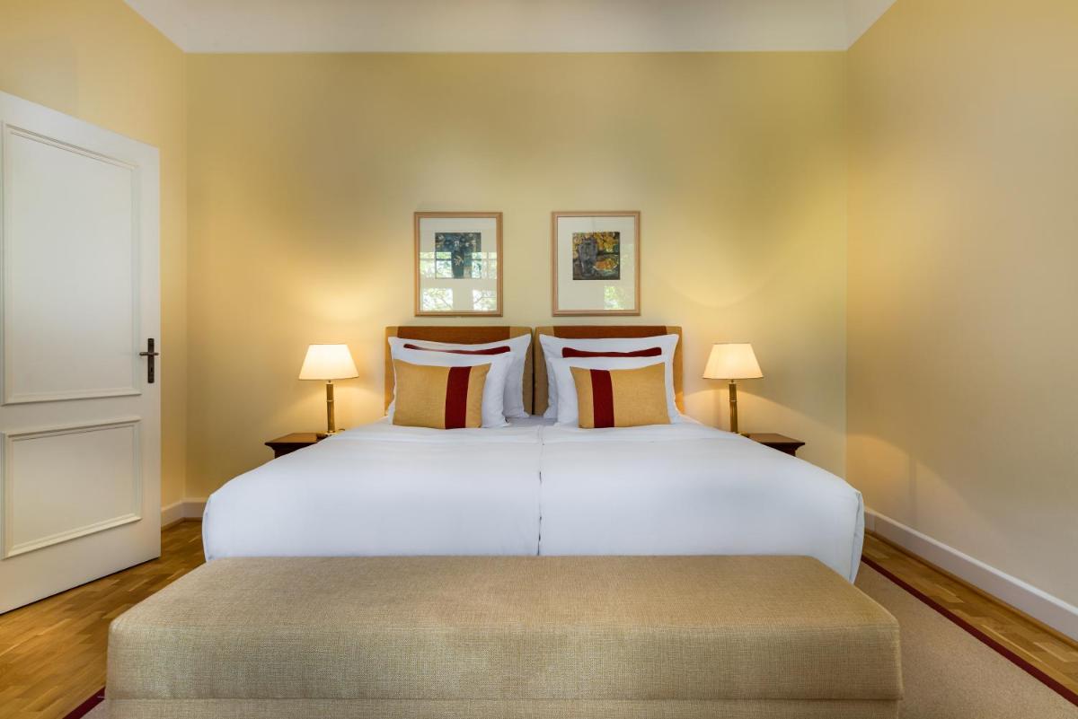 Ein Bett oder Betten in einem Zimmer der Unterkunft Falkenstein Grand, Autograph Collection Ein Bett oder Betten in einem Zimmer der Unterkunft Falkenstein Grand, Autograph Collection