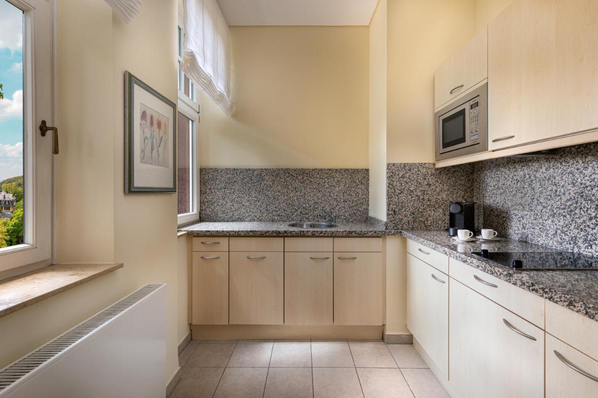 Küche/Küchenzeile in der Unterkunft Falkenstein Grand, Autograph Collection Küche/Küchenzeile in der Unterkunft Falkenstein Grand, Autograph Collection