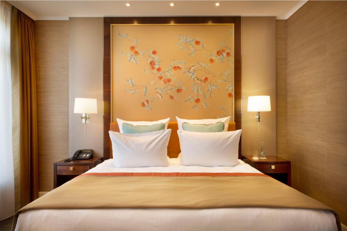 Ein Bett oder Betten in einem Zimmer der Unterkunft Falkenstein Grand, Autograph Collection Ein Bett oder Betten in einem Zimmer der Unterkunft Falkenstein Grand, Autograph Collection