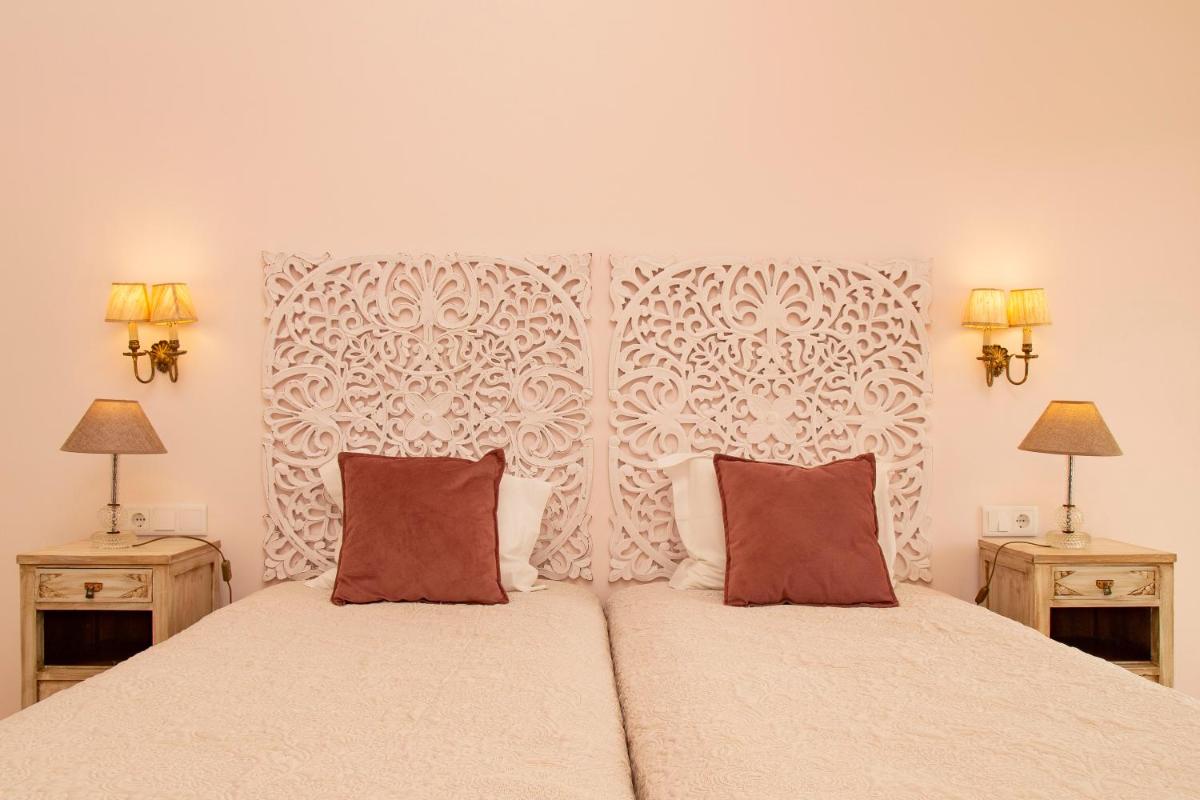 Uma cama ou camas num quarto em Aires da Serra Hotel