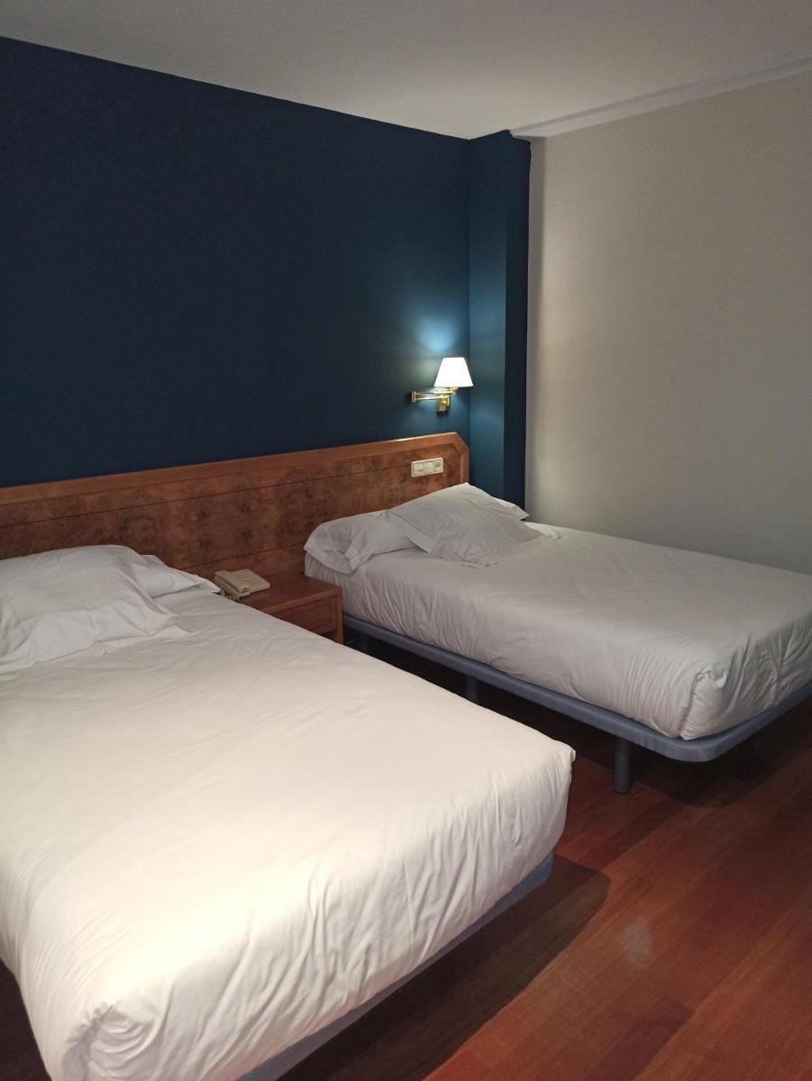 Cama o camas de una habitación en ARVA Spa París