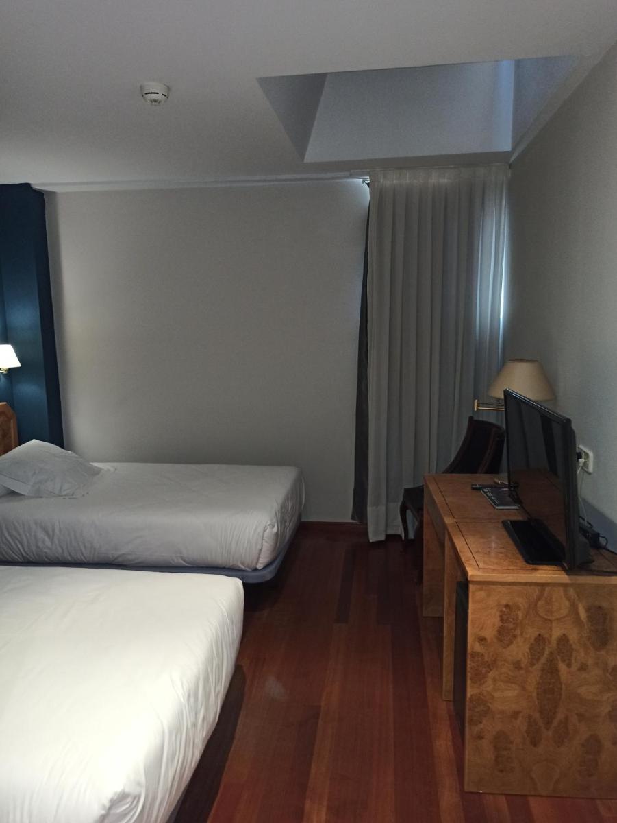 Cama o camas de una habitación en ARVA Spa París