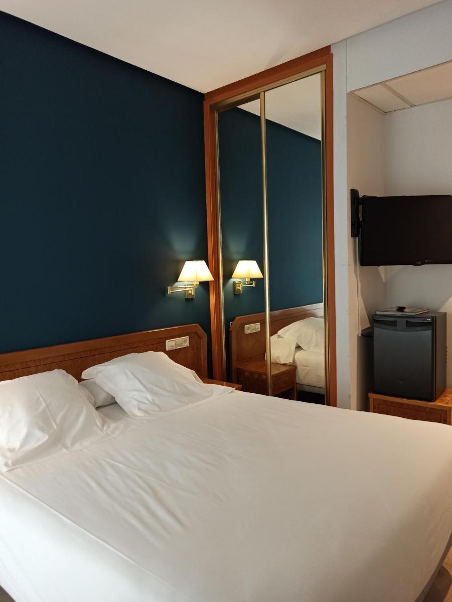 Cama o camas de una habitación en ARVA Spa París